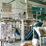 Két egység Millet automata csomagológép teljes telepítést és hibakeresést végez ügyfelünk gyárában